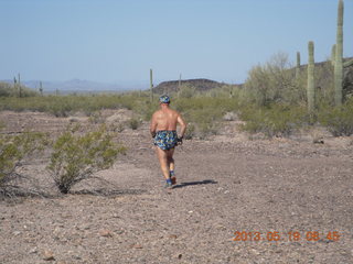 Adam running at Grand Gulch (tripod and timer)