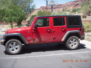 dirty red Jeep