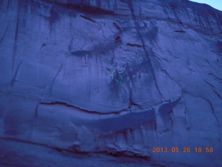 night boat ride along the Colorado River - woman's face in the rock markings