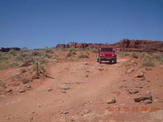 Chicken Corner drive - my red Jeep driving down a hill