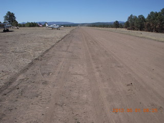 1226 8a1. Negrito work party - new runway with N8377W in the distance