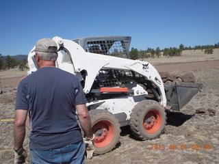 Negrito work party - picking up rocks