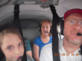 1236 8cq. Nikki, Rebeka, and Adam flying in N8377W