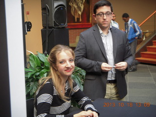 Elephant Mountain hike - Beth taking a picture of an apple