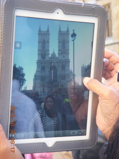 62 8ew. London tour - person taking a picture of Westminster Abbey