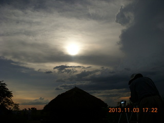 182 8f3. Uganda - eclipse site - sun behind clouds