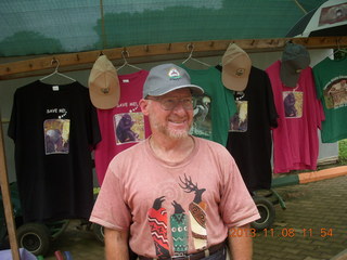 Uganda - Entebbe - Uganda Wildlife Education Center (UWEC) - Adam wearing cap + t-shirts