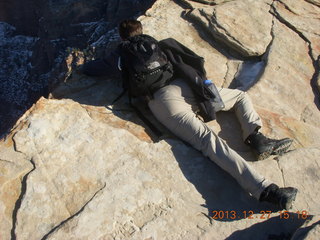 Zion National Park - Angels Landing hike - Brian leaning over taking a picture at the top