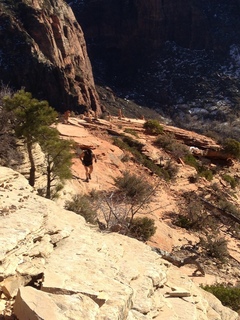 Zion National Park - Angels Landing hike - at the top - Adam hiking to the ledge