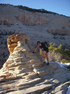 Zion National Park - Angels Landing hike - at the top - Adam climbing a hill