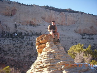 Zion National Park - Angels Landing hike - at the top - Adam sitting on a hill