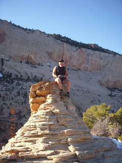 Zion National Park - Angels Landing hike - at the top - Adam sitting on a hill