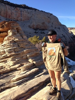 Zion National Park - Angels Landing hike - at the top - Brian sitting on a hill