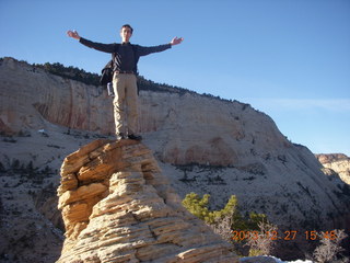 Zion National Park - Angels Landing hike - at the top - Adam sitting on a hill