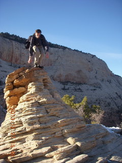 Zion National Park - Angels Landing hike - at the top - Adam sitting on a hill