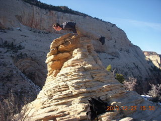 Zion National Park - Angels Landing hike - at the top - Brian balanced on a hill