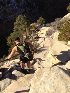 Zion National Park - Angels Landing hike - at the top - Adam climbing a hilll