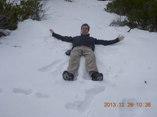 Zion National Park - Cable Mountain hike - Brian making a snow angel