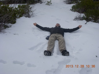 Zion National Park - Cable Mountain hike - Brian making a snow angel