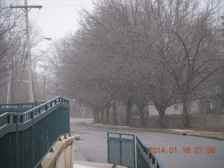 it's snowing in Melrose Park