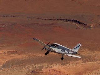 1325 8hn. N8377W in flight over Valley of Fire