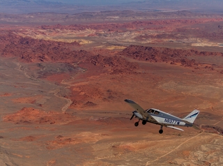 1334 8hn. N8377W in flight over Valley of Fire