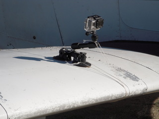 GoPro video camera mounted on wing N8377W