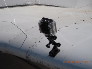 Yaseen's pictures - Adam and Jim G and the video camera on the wing of N8377W
