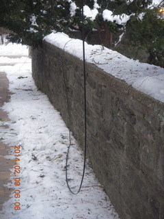 snow in walkway with downed wires Betsy's house