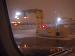 snow out the window of my airline flight