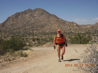 Adam running at Grand Gulch (tripod and timer)