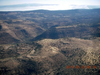 127 8m3. aerial - flying to Double Circle Ranch - smoke from fires