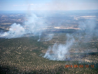 192 8m3. aerial - flying back from Double Circle Ranch - smoke from fires