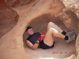 Arches National Park - Devil's Garden hike - Adam in hole in the rock