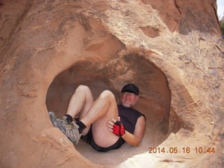 2327 8mg. Arches National Park - Devil's Garden hike - Adam in hole in the rock