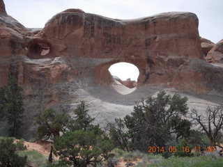 Arches National Park - Devil's Garden hike - Adam in hole in the rock