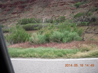 drive to Fisher Tower along highway 128 - bicyclists