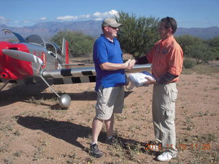 raffle winner with Mark Spencer and Mark's airplane