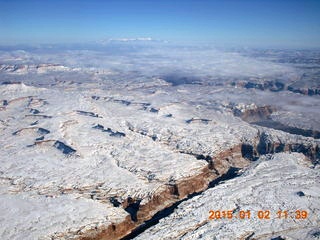 aerial - Navajo Mountain in clouds