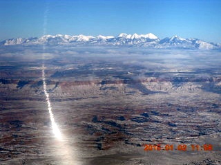 aerial - snow and clouds and canyon - Colorado River