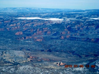 211 8v5. aerial - snowy canyonlands - Colorado hills