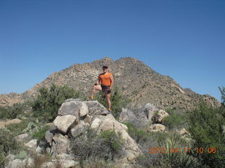 2638 8yb. Bagdad run/hike - Adam on a rock