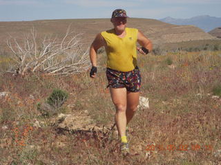 Adam running at Grand Gulch (tripod and timer)