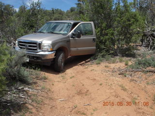 drive to Calamity Mine - very tough side road - truck driving a tight curve