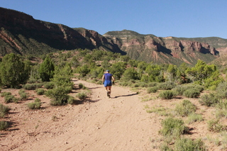 Canyonlands National Park - Lathrop trail hike - Adam running (back)