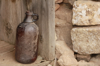 565 8zw. Calamity Mine camp site - bottle