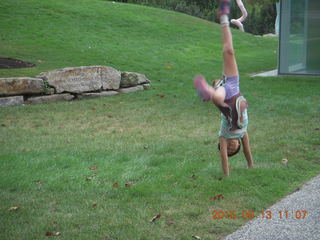 Cecelia doing cartwheel or handstand