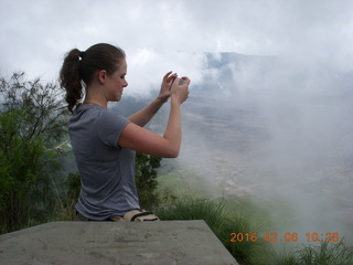 111 996. Indonesia - Mighty Mt. Bromo - young lady taking a picture