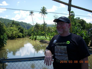 114 998. Indonesia village - Adam on bridge