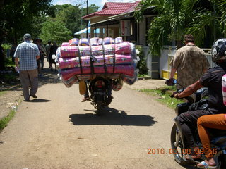 143 998. Indonesia village - rider with big load